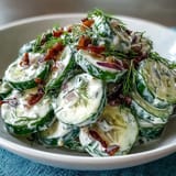 Creamy Cucumber Salad with Dill and Greek Yogurt, a light and refreshing side dish with crisp cucumbers and tangy yogurt dressing.
