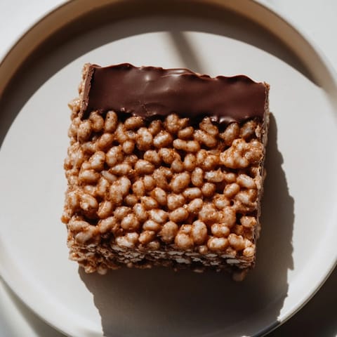 Warm, melted marshmallows combined with crispy cereal create these classic Rice Krispie Treats, perfect.