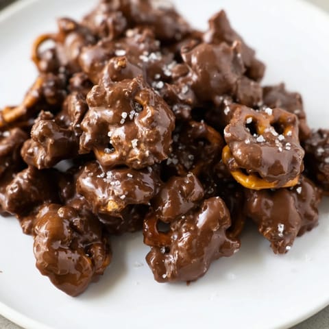 Sweet, chewy caramel coats crispy pretzel pieces in these easy homemade Pretzel Candy Clusters.